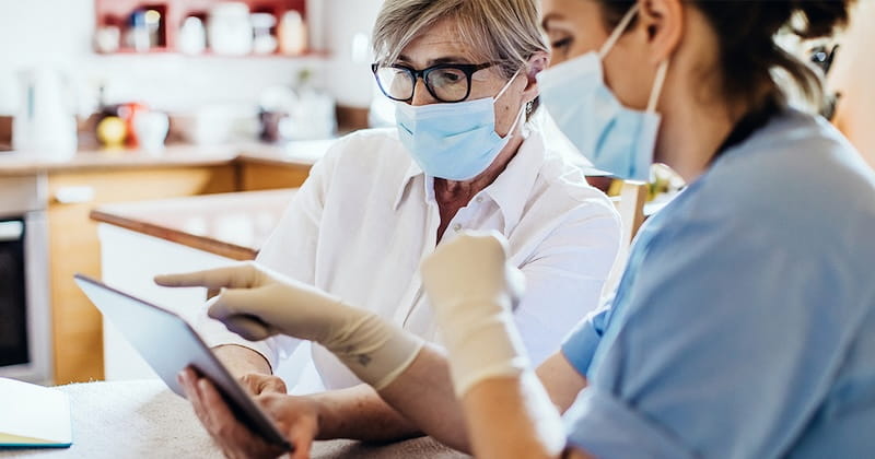 Doctors discussing chart