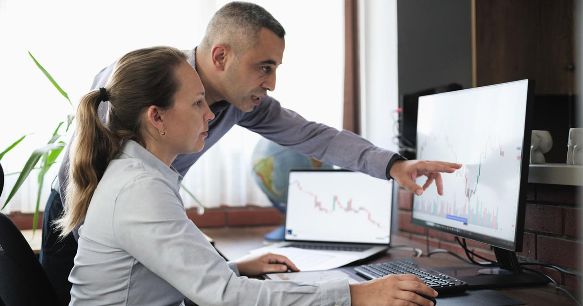 2 workers reviewing